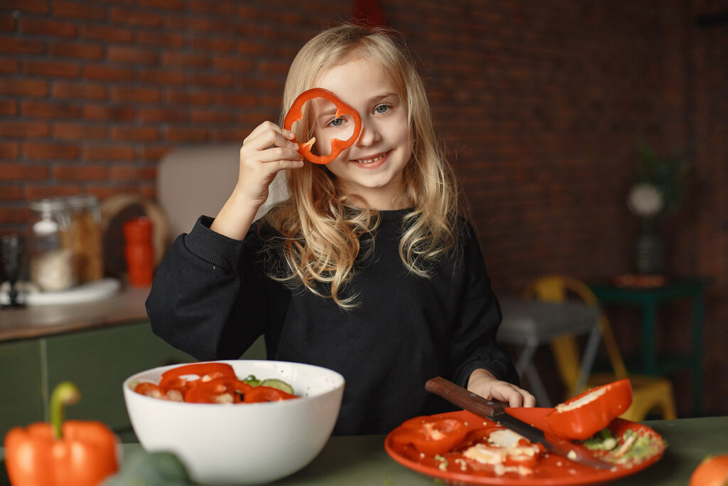 little-girl-prepare-salan-in-a-kitchen