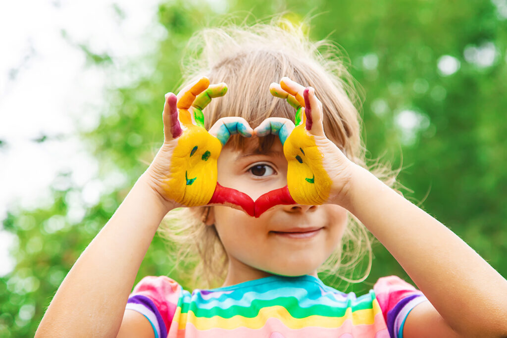 children-hands-in-colors-summer-photo-selective-focus