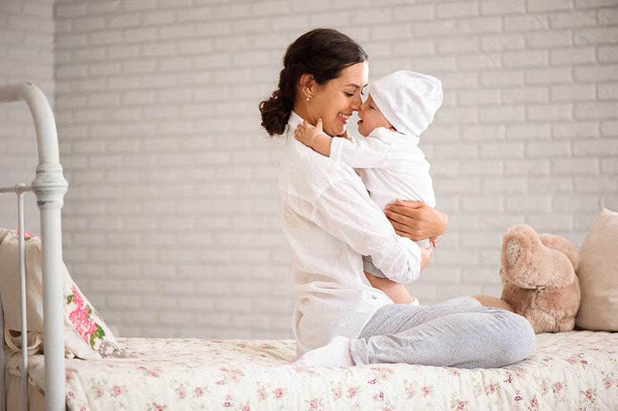 mother-playing-with-her-toddler-boy-smiling-2