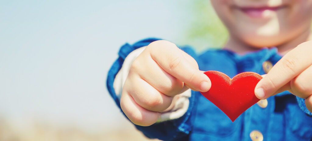 the-heart-is-in-the-hands-of-the-child-selective-focus